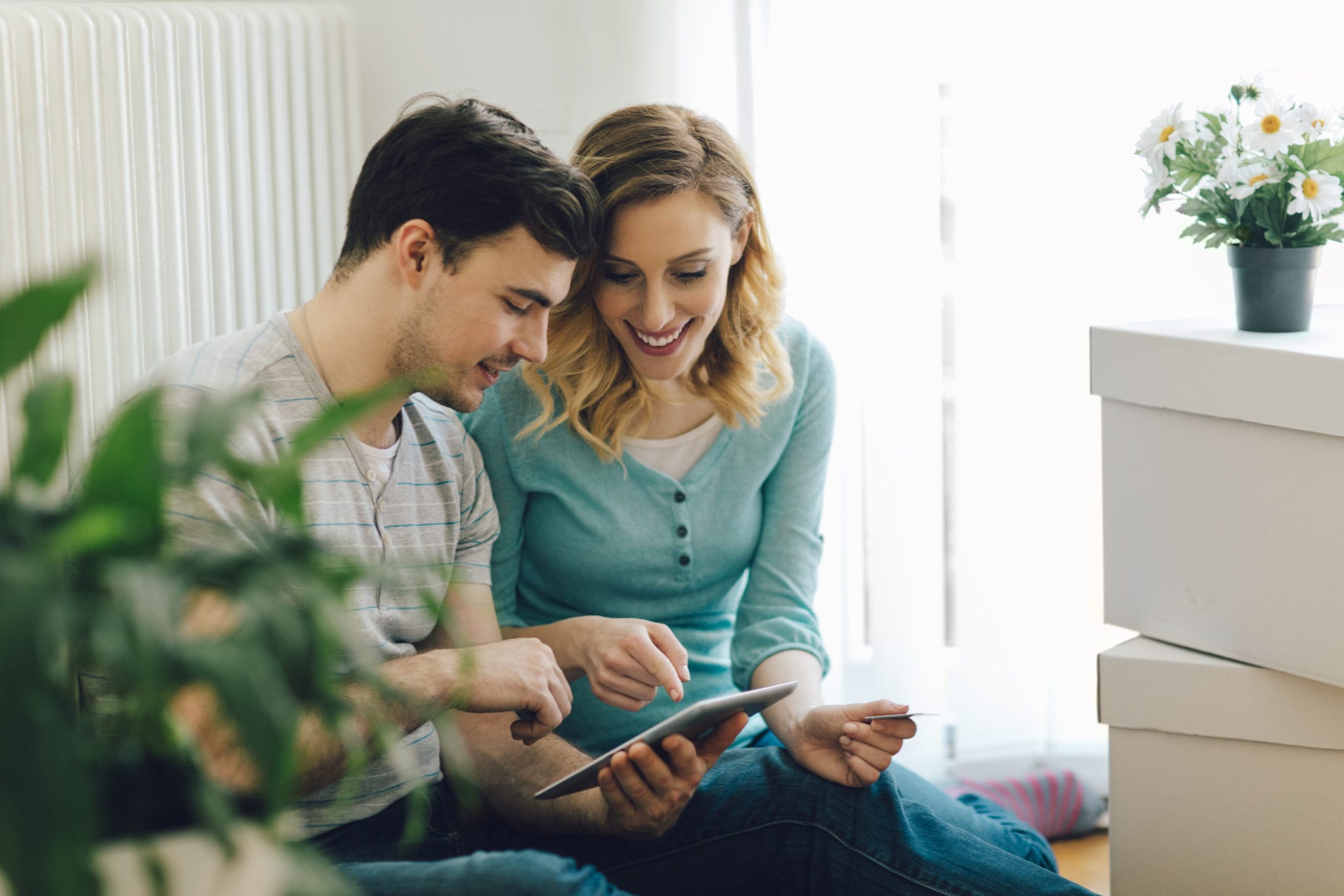 Young Couple iPad Credit Card